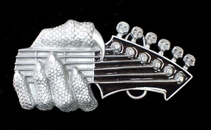LARGE CLAWED LIZARD HAND PLAYING GUITAR W/SKULL TUNING PEGS BELT BUCKLE BERGAMOT - Picture 1 of 2