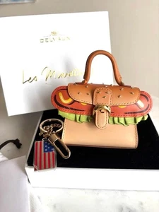 [DDP] Delvaux Hot Dog brillanter Taschenanhänger Schlüsselanhänger Luxus Accessoire mit Box - Bild 1 von 24