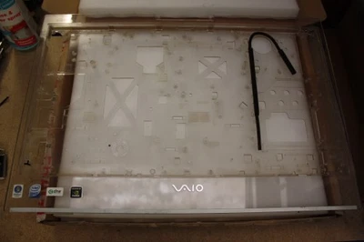 Bisel marco frontal Sony Vaio serie VGC-LA 2-675-977 Foto 1 de 4
