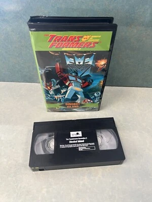 Transformers Generation 2 VHS Clamshell Dinbot Island  1998 - Image 1 of 4