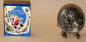 1:12 SCALE MINIATURE BOOK SANTA’S TOY SHOP DOLLHOUSE SCALE - Picture 1 of 6
