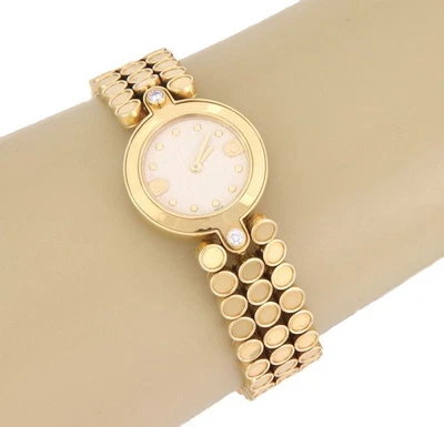Reloj de pulsera Harry Winston de cuarzo de oro amarillo de 18 quilates con diamantes para dama Foto 1 de 4