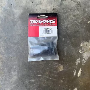 TRAXXAS 4943 Steering Bellcranks (2) Bushings (4) Post Spacers (2) Screws (2) - Picture 1 of 2