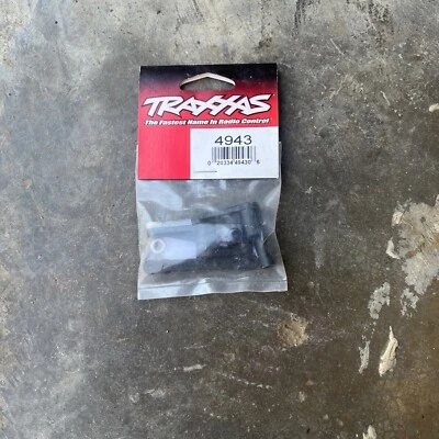 TRAXXAS 4943 Steering Bellcranks (2) Bushings (4) Post Spacers (2) Screws (2) - Image 1 of 2