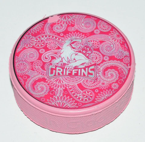 GRAND RAPIDS GRIFFINS Team Logo on PINK COLORED AHL SOUVENIR PUCK Chipped Logo Cover