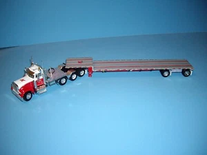 DCP PRIMERA MARCHA 1/64 ROJO Y BLANCO KAUFF PETERBILT 379 CON PLATAFORMA DE CAÍDA DE EJE EXTENDIDO - Imagen 1 de 14