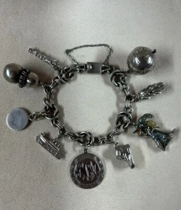 "Pulsera de plata de ley Taxco de colección con 8 dijes 7,25""" - Imagen 1 de 9