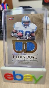 2007 Barry Sanders Fleer Ultra Dual Materials Gold /99 RARE Game worn used Lions