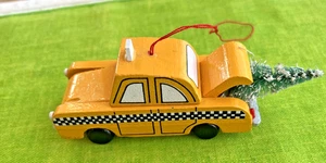 Wooden Yellow TAXI CAB CHRISTMAS ORNAMENT w/Christmas Tree in Trunk - Picture 1 of 4