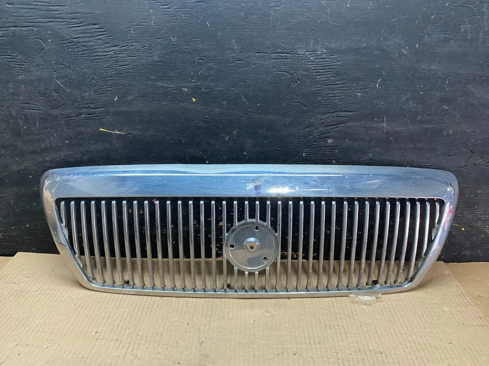 Parrilla superior delantera Mercury Grand Marquis 2003 a 2005 mercado de accesorios U7599 DG Foto 1 de 4