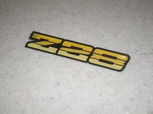 91 Camaro Z28 YELLOW DASH EMBLEM 90 92 tpi T5 interior Main black interior - Picture 1 of 2