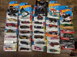 Huge lot 35 Main Line Hot Wheels Fantasy Movie TV Batman NEW DAMAGED PACKAGING - Picture 1 of 5