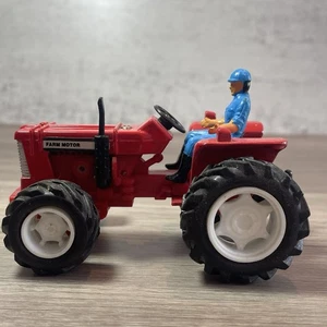 NEW-RAY-“Farm Motor" red Tractor with blue person driving-Push & Go Action - Picture 1 of 14