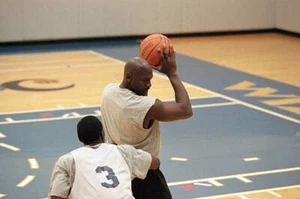 Washington Wizards executive Michael Jordan with Laron Profit duri- Old Photo 1 - Picture 1 of 1