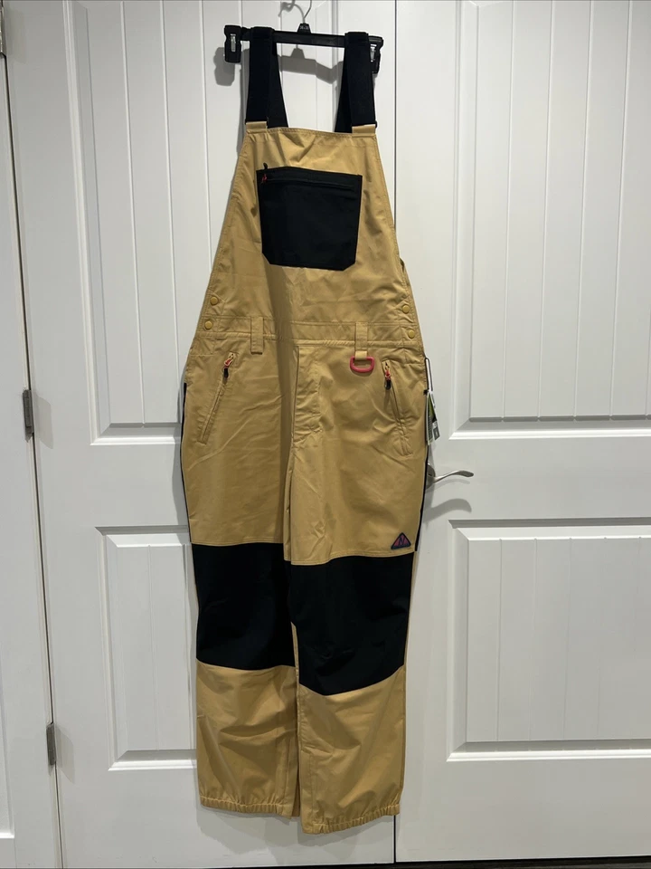 Pantalones de nieve Neff Roan con tirantes para hombre talla XL caqui/negro con bolsillos tostados. Foto 1 de 4