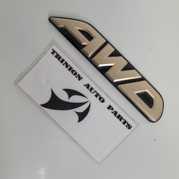 2000-2004 Subaru Outback Emblem Rear Hatch "AWD" Logo Gold OEM - Image 1 of 3