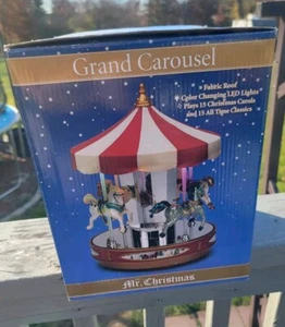 Grand Carrousel Monsieur Noël joue 15 chants de Noël lumières LED et rotatifs - Photo 1/15