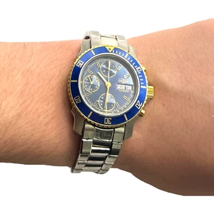 DAVOSA - SWISS MADE - VINTAGE - AUTOMATIC - 10 ATMOS - BLUE & GOLD DIAL - Picture 1 of 6