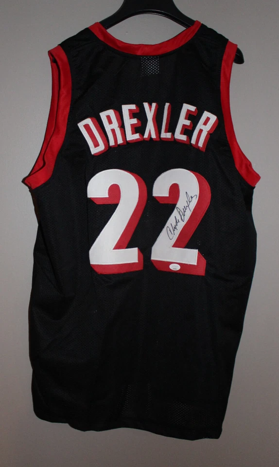 TRAILBLAZERS CLYDE DREXLER AUTOGRAPHED BLACK JERSEY THE GLIDE JSA XL - Image 1 of 4