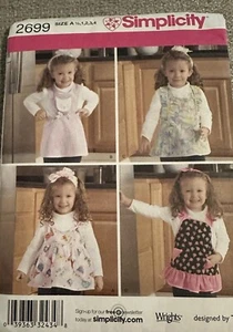 Girls Apron Sewing Pattern Toddlers Size 1/2, 1, 2, 3, 4 Simplicity 2699 Uncut - Picture 1 of 4