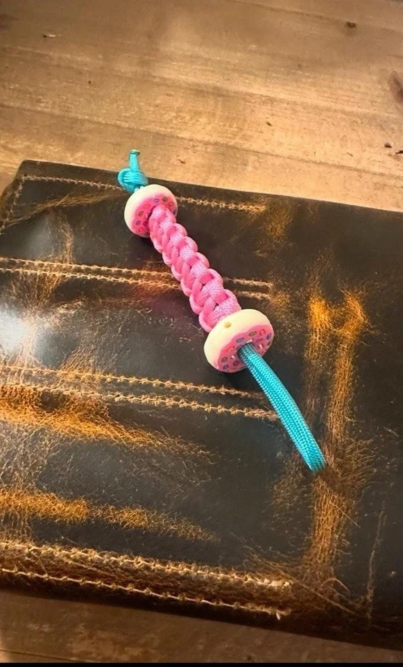 Cordón para cuchillo Donut con 2 cuentas de goma Donutrubber Donut  Foto 1 de 4