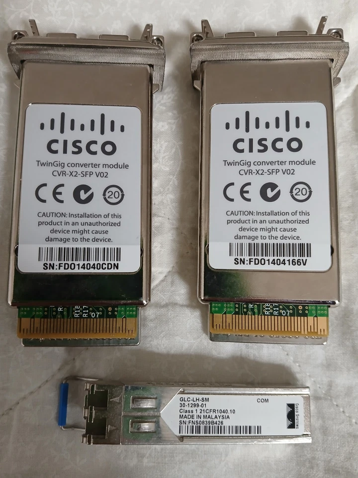 2 × Cisco TwinGig Converter Module CVR-X2-SFP V02 + Cisco SFP Transceiver Module - Image 1 of 1