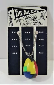 Llavero de colección con lágrimas rompecabezas en exhibición tarjeta de tienda antigua - Imagen 1 de 2