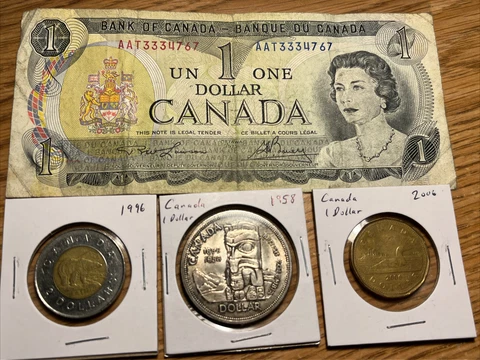 1958 Canada silver dollar, 73’ $1 note, 96' $2 and 2006 $1 coins Cover