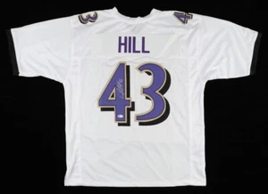 Camiseta de los Baltimore Ravens firmada por Justice Hill (certificado de autenticidad Beckett) selección del draft 2019 R.B. - Imagen 1 de 4