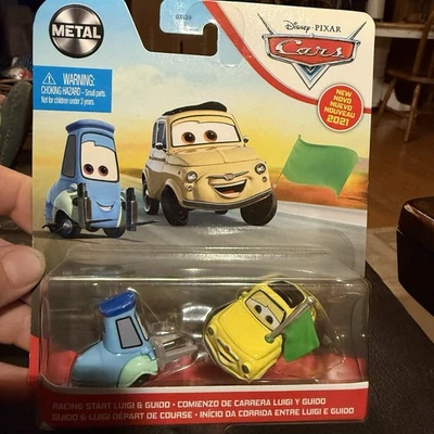 ✅DISNEY PIXAR COCHES CARRERAS INICIO LUIGI GUIDO BANDERA VERDE 2021 SERIE METAL NUEVO Foto 1 de 2