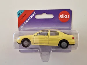 SIKU 1057 FORD MONDEO GELB OVP - Picture 1 of 1