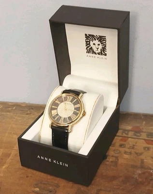 Reloj de cuarzo Anne Klein con acento de diamantes tono dorado con correa de reloj con caparazón de tortuga oscura Foto 1 de 4