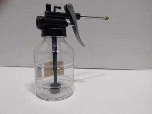 $10 NEW PLASTIC Oil Can Cast Body STRAIGHT METAL Spout Pump Oiler Ships FREE - Picture 1 of 8