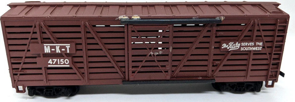 TRIX AUSTRIA N SCALE: THE KATY, M-K-T 47150,  STOCK CAR VINTAGE, BROWN - Image 1 of 3