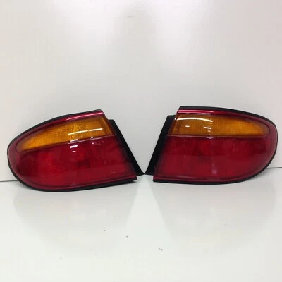1995 - 1998 年马自达 Millenia 左 + 右发球杆 + 乘客侧尾灯 原始设备制造商 闪亮 — 第 1/4 张图片