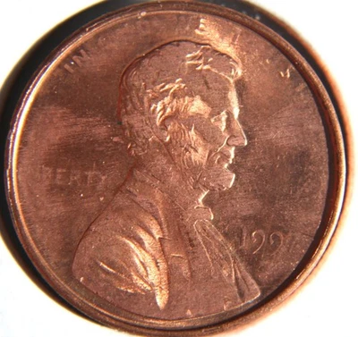 1997  Lincoln Cent Struck Thru grease Red - Image 1 of 3