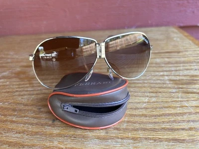 Gafas de sol de aviador plegables Ferrari vintage marco dorado lentes marrones con estuche Foto 1 de 4