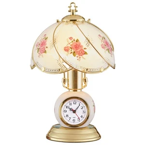 Roségoldfarbene Tischlampe mit Uhrenfuß Touch - Bild 1 von 2