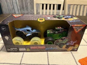 2024 Spin Master Monster Jam GRAVE DIGGER MEGALODON 2pk Light-Up Monster Trucks - Picture 1 of 1