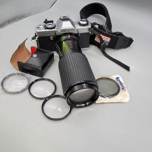 Minolta XG-A 35mm SLR Film Camera W/ 3 Close-Up Lens, Polarized Lens, 300mm Lens - Picture 1 of 21