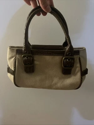 Bolso de mano Tommy Hilfiger vintage de lona beige con ribete de cuero sintético marrón Foto 1 de 4