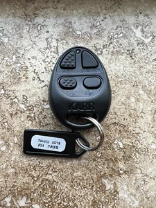 LLAVERO REMOTO KARR FOB (4 BOTONES) FCC: OXC743301 *LED AZUL* ¡COMO NUEVO! - Imagen 1 de 3