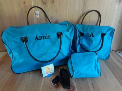 Equipaje de viaje Annie azul 3 piezas bolsa de lona con ruedas bolso de mano y estuche personal  Foto 1 de 4
