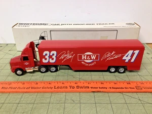1/64 scale die cast H&W Motor Motor Sports drop-bed semi truck by Ertl - Picture 1 of 7