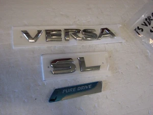 2013-2021 Nissan Versa SL PURE DRIVE Emblem Logo Badge Trunk Gate Rear SET OEM - Bild 1 von 3