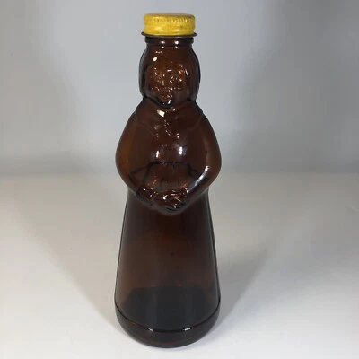 1980 Mrs. Butterworth Amber Glass Bottle With Yellow Metal Lid Syrup Bottle 8.5” - Image 1 of 4