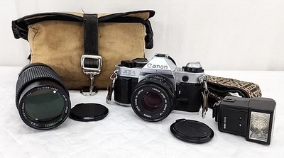 Cámara fotográfica Canon AE-1 35 mm SLR con lente de 50 mm y 80-200 mm probada funcionando Foto 1 de 4