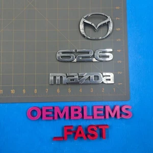 1998-2002 Mazda 626 OEM Factory Chrome Trunk Deck Hatch Lid Emblem Set - Picture 1 of 9