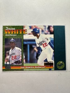 K58,899 - 1999 Pacific Omega Platinum Blue #126 Devon White #/75