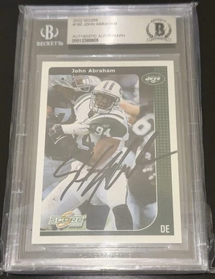 Tarjeta de puntuación firmada a mano John Abraham 2002 - Beckett BAS losa JETS Foto 1 de 2